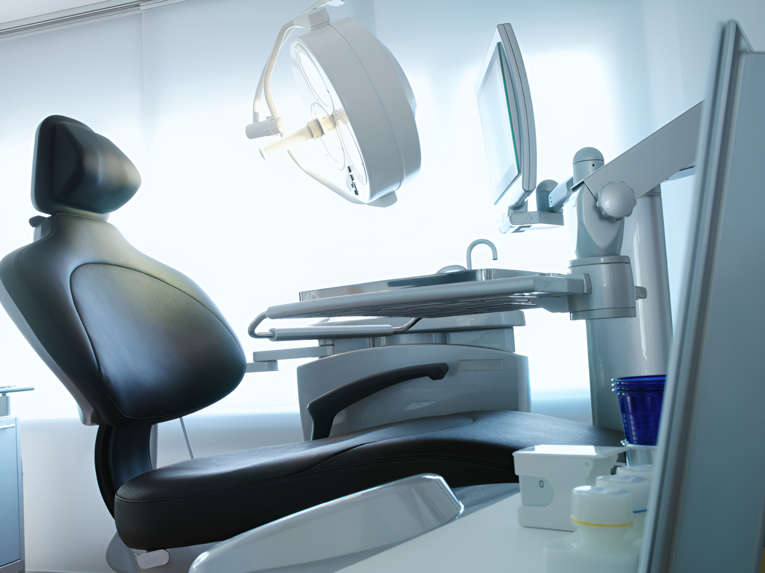 Modern dental chair in a clean surgery